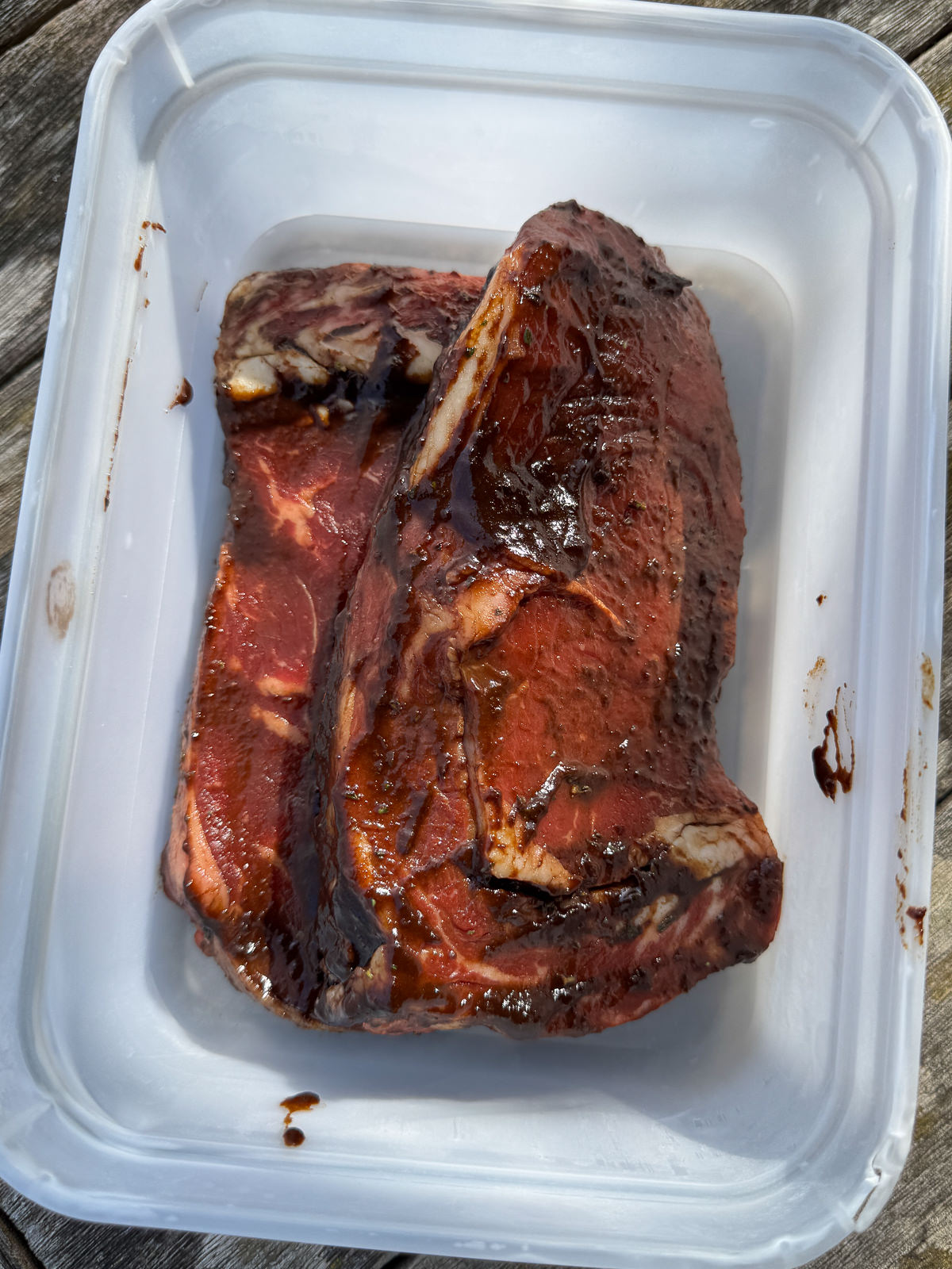 ribeye steaks in marinade