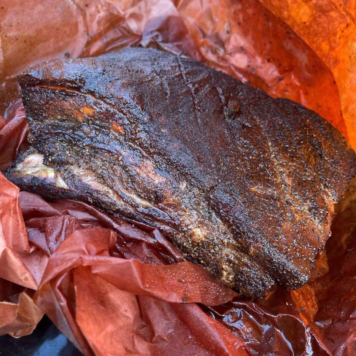 smoked pork belly in butcher's paper