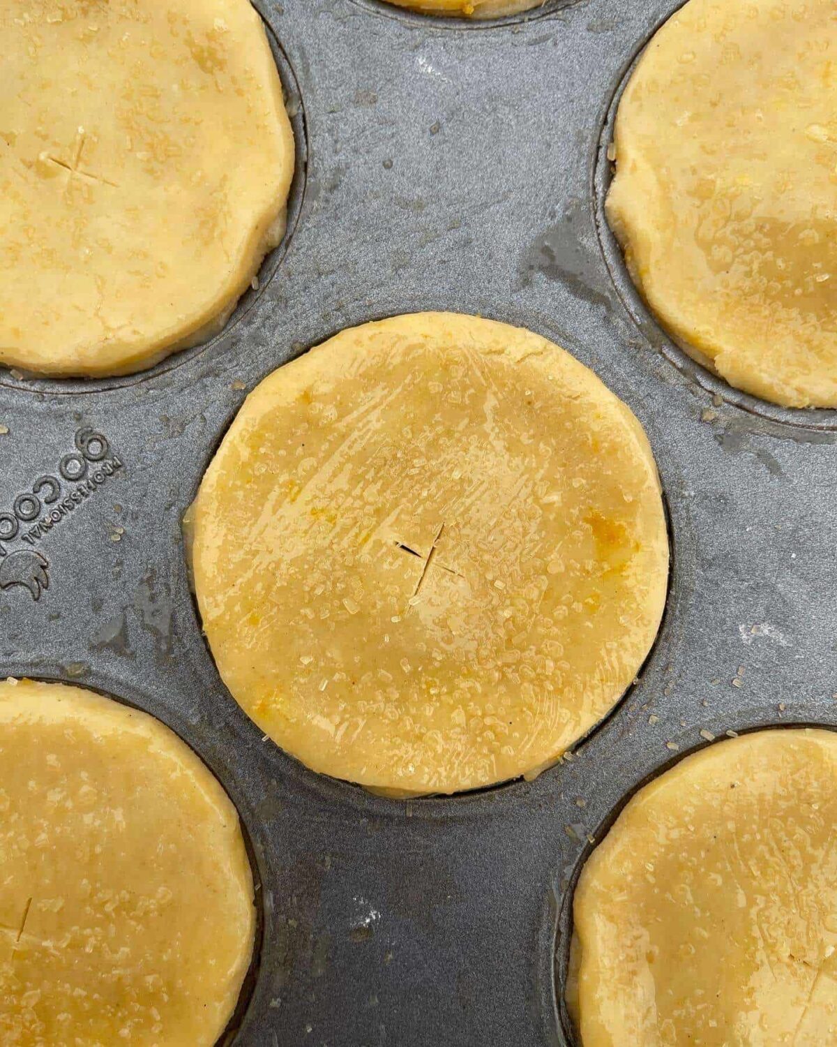 egg washed mince pies with sugar top