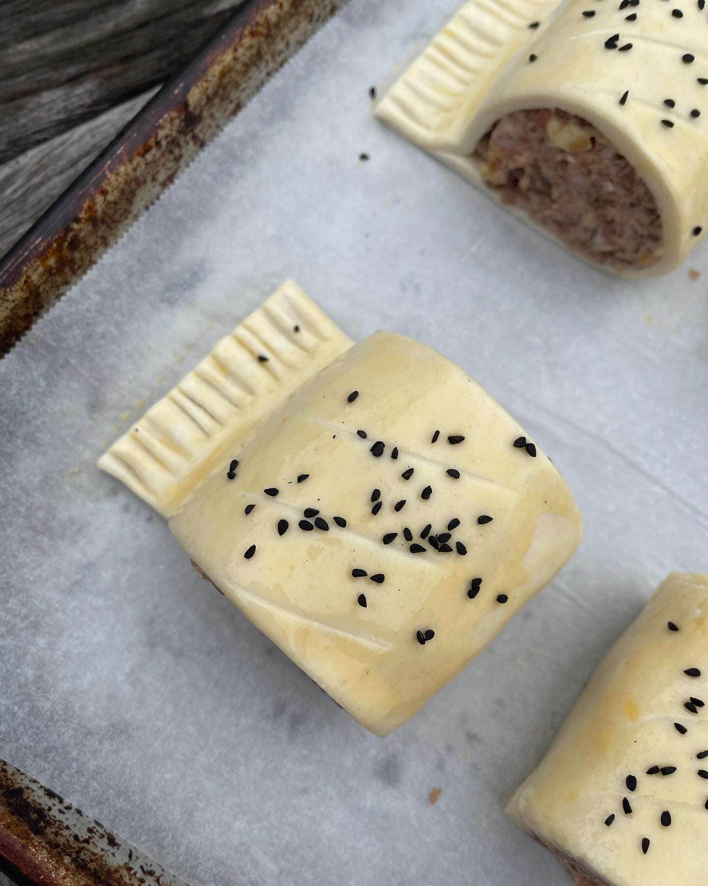 nigella seed topped sausage rolls