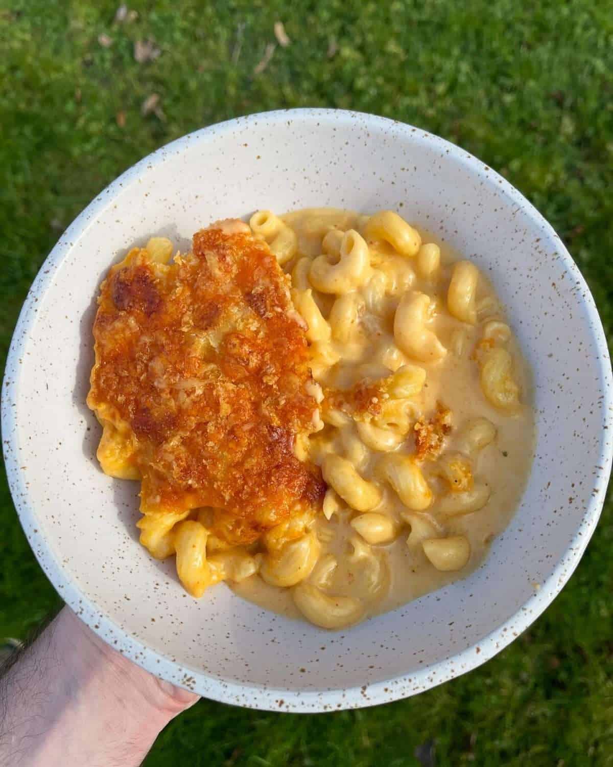 a portion of four cheese sriracha mac & cheese 