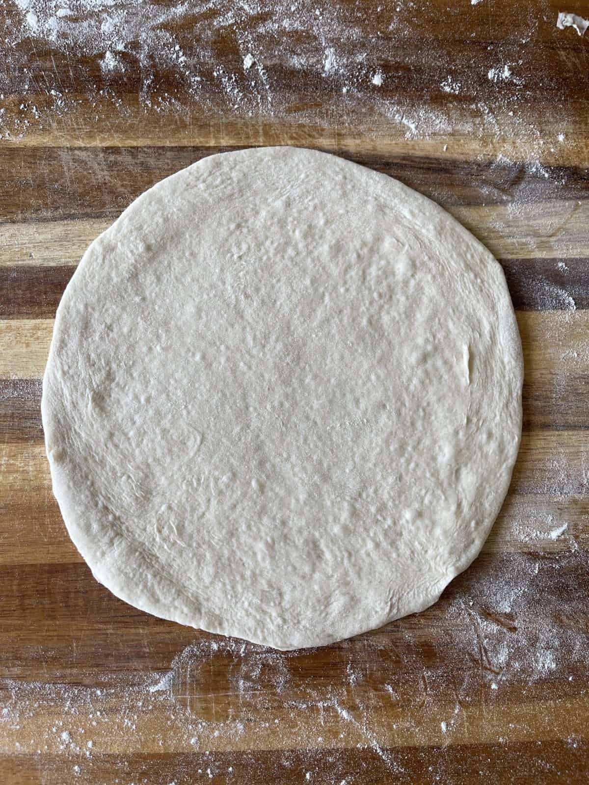 rolled out dough in a circle