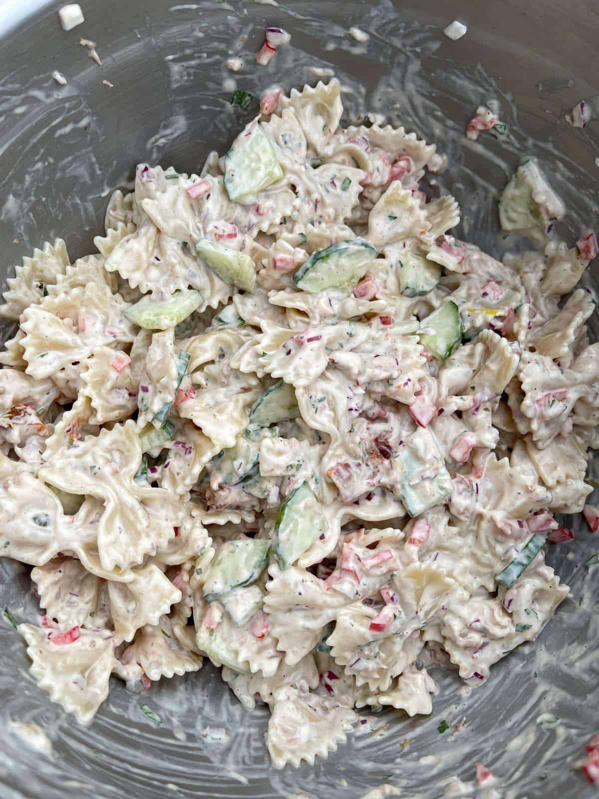 tuna pasta salad in mixing bowl