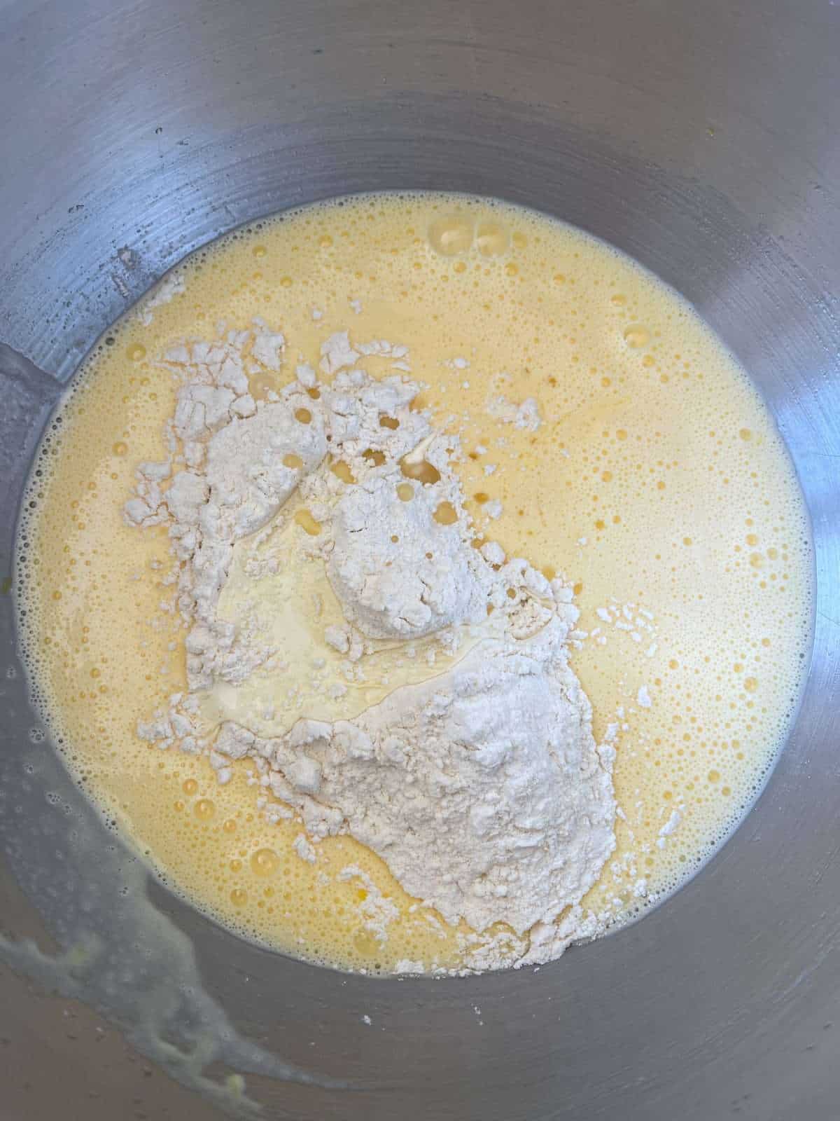 folding flour into lemon cake batter