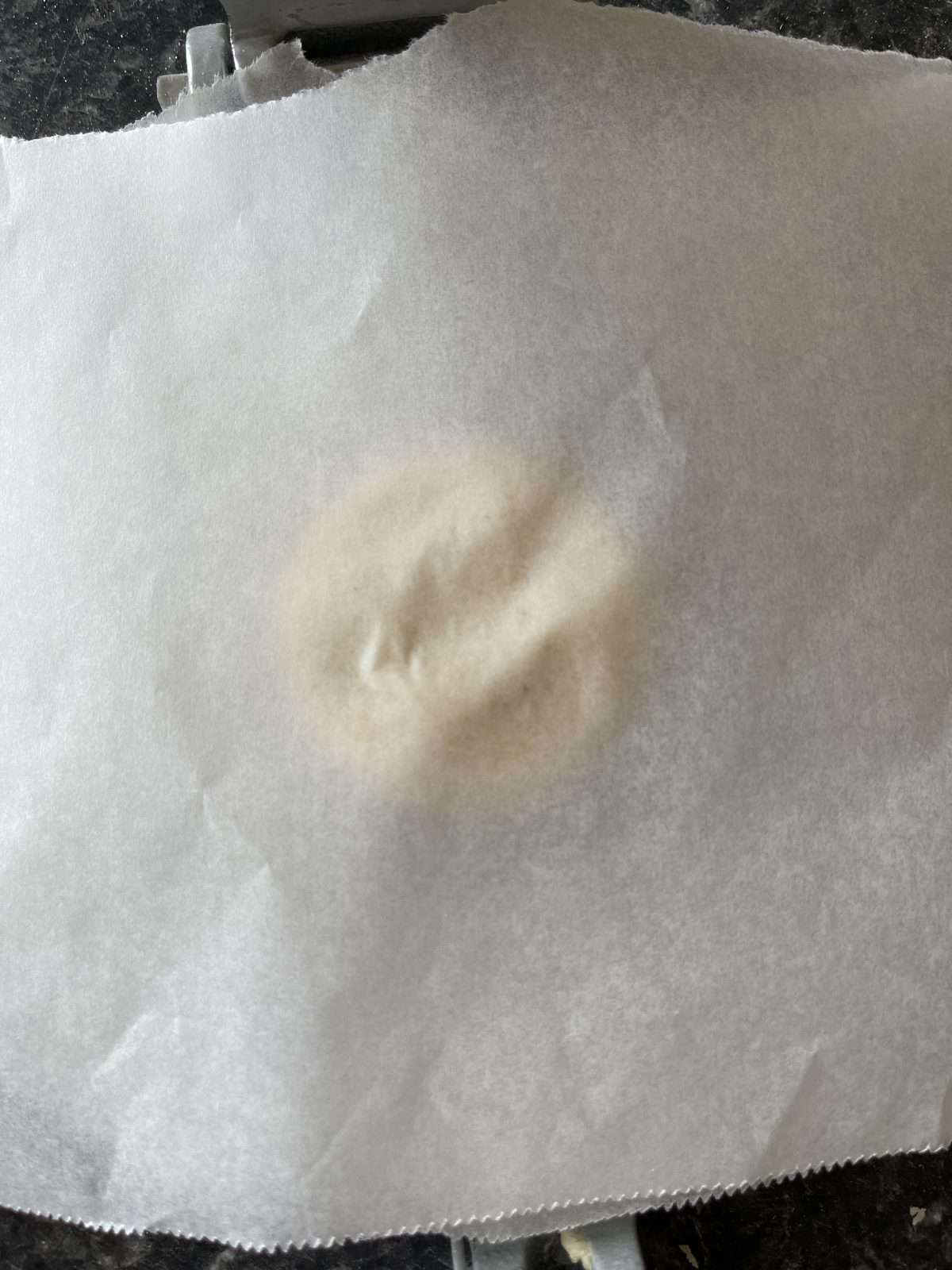 pressing tortilla dough