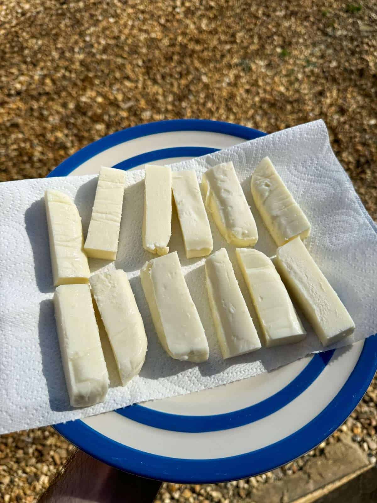 block of mozzarella cut into sticks