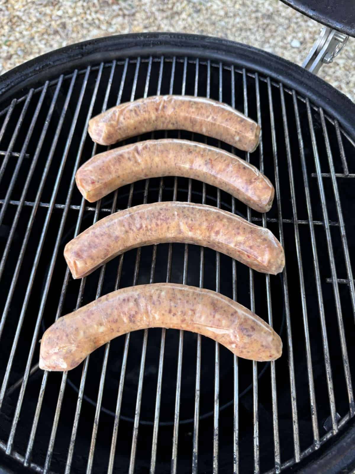 sausages cooking on a bbq