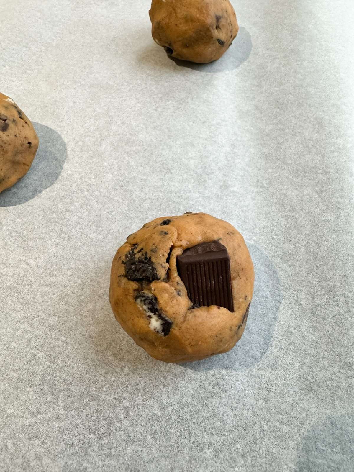 ball of cookie dough ready to bake