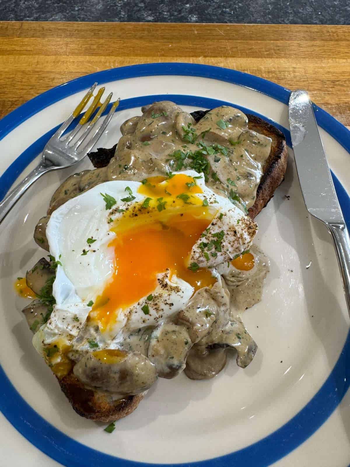 mushrooms on toast with runny poached egg
