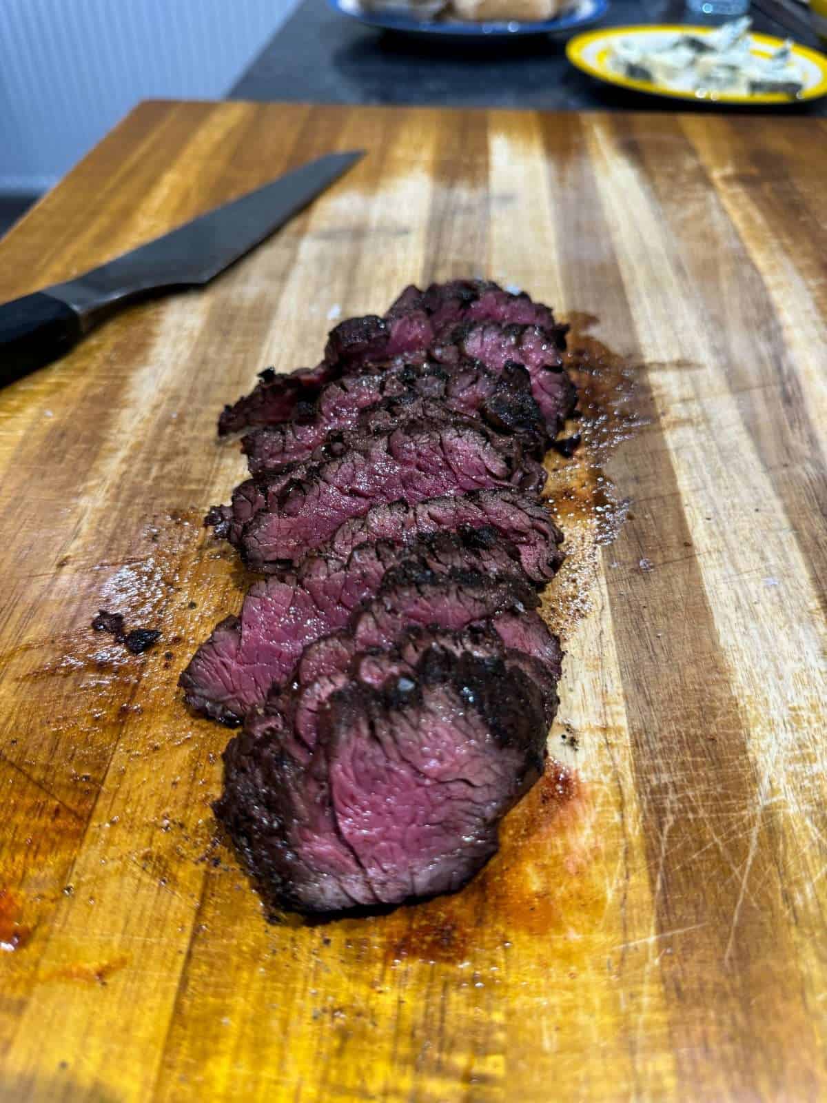 slicing hanger steak against the grain