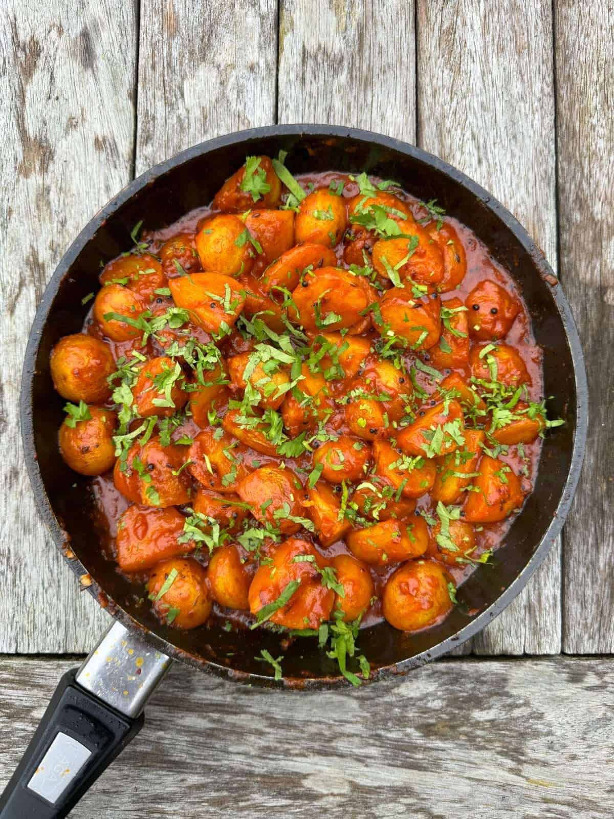 bombay new potatoes in frying pan