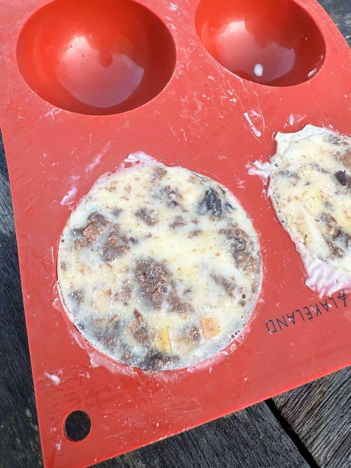 ice cream frozen in half sphere mould