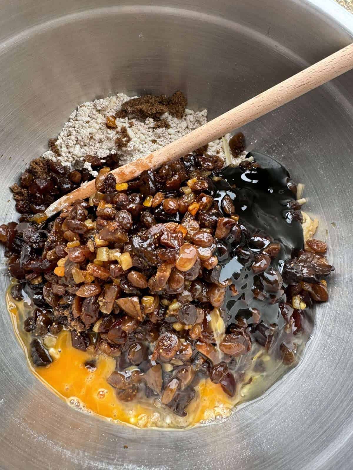 mixing fruit pudding batter