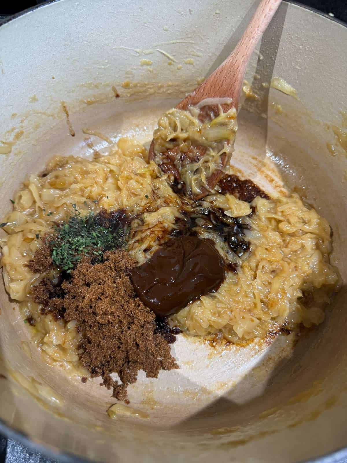 adding marmite to caramelised onions