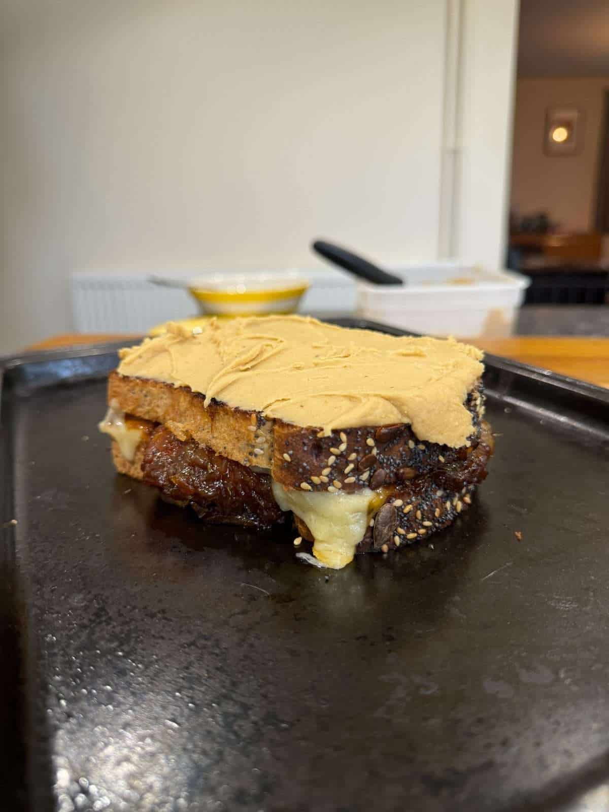 grilled cheese topped with rarebit