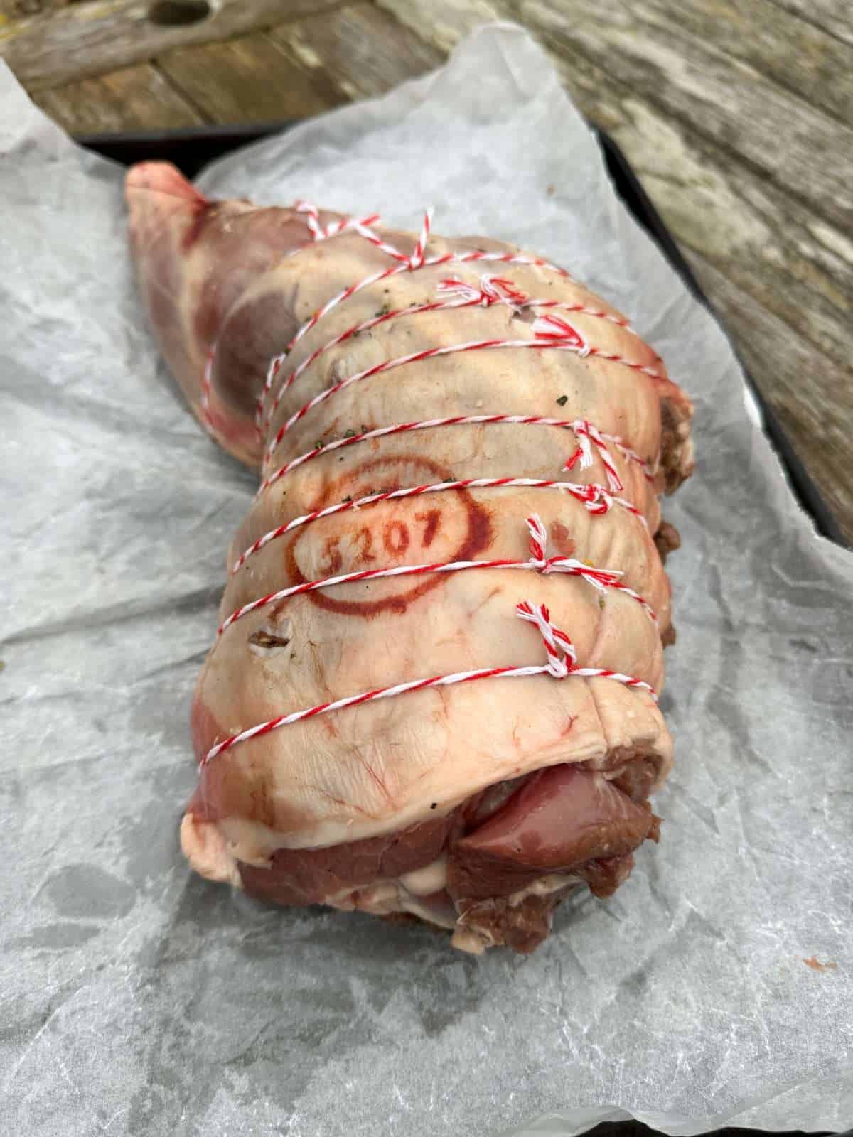 boned and rolled leg of lamb with shank bone attached