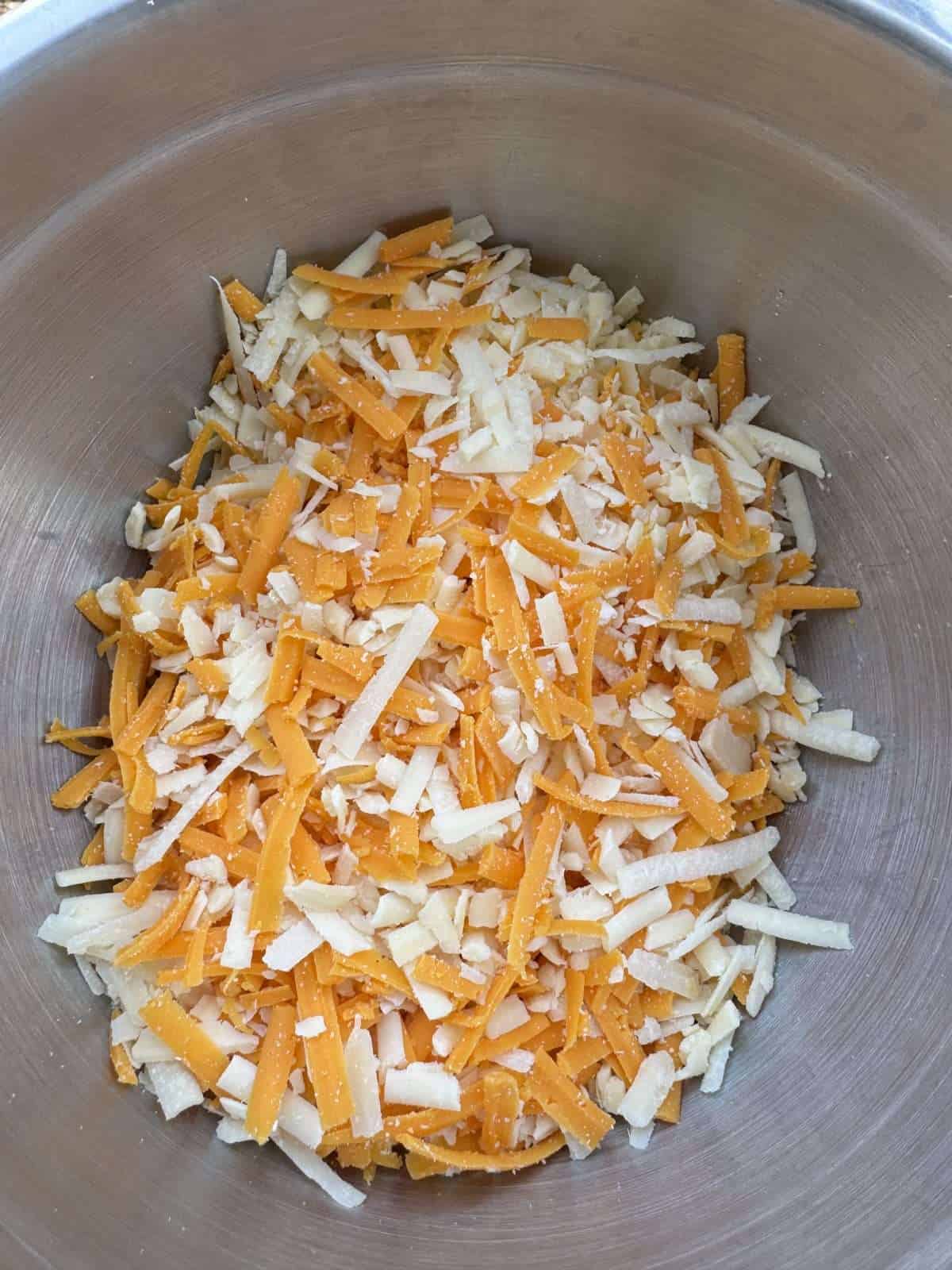 3 cheeses grated in bowl