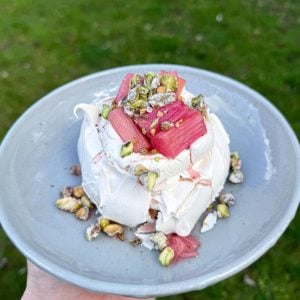 rhubarb & custard pavlova with crystallised pistachios