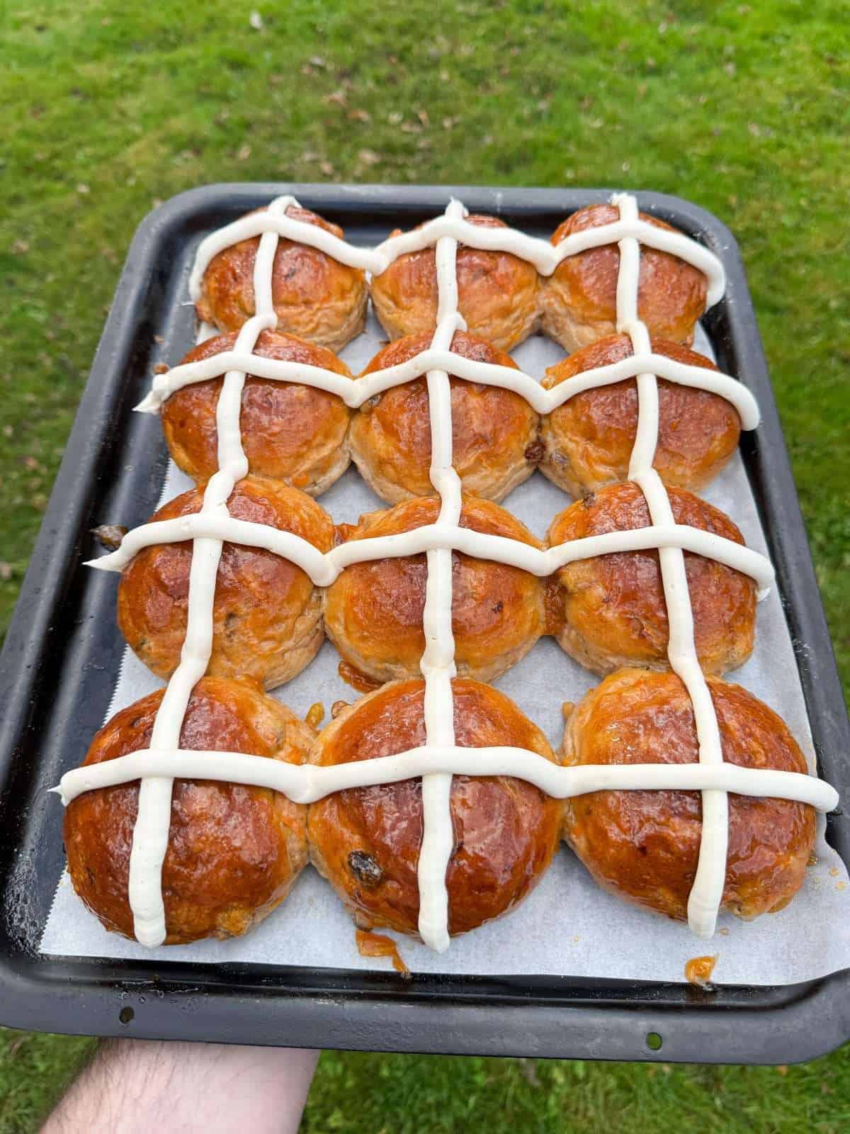 a dozen carrot cake hot cross buns