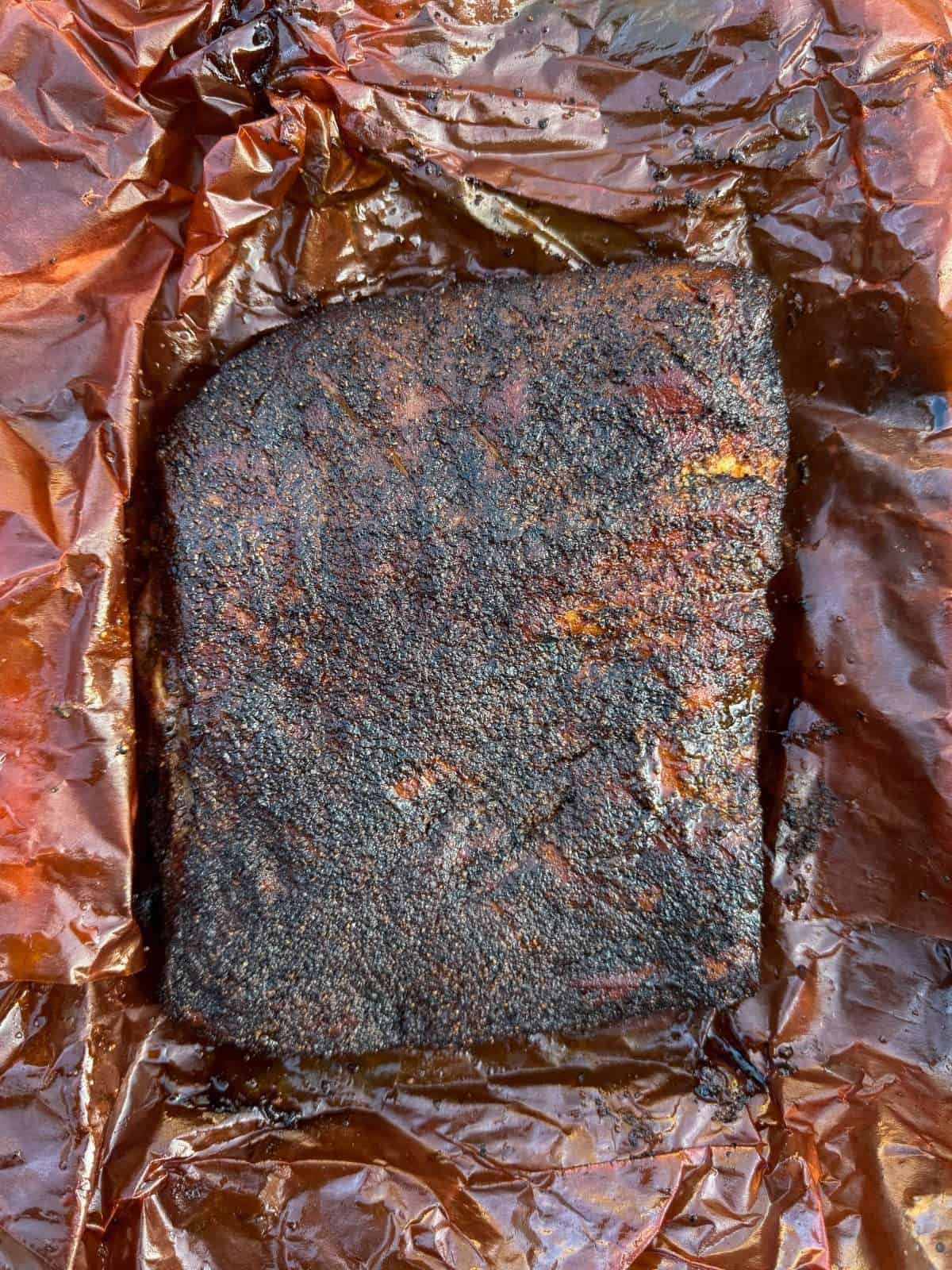 smoked pork belly wrapped in butcher's paper