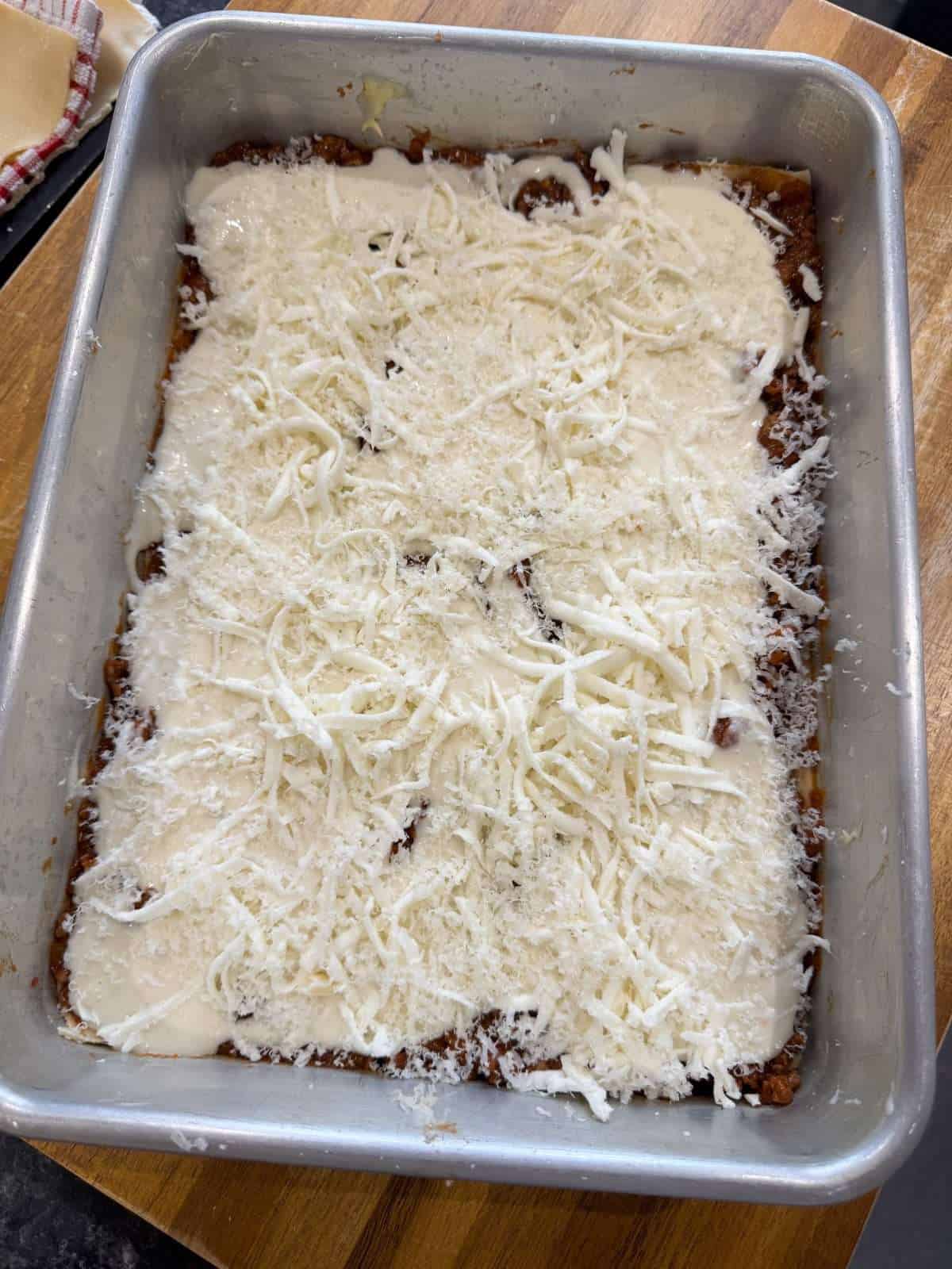 roasted garlic bechamel cheese layer