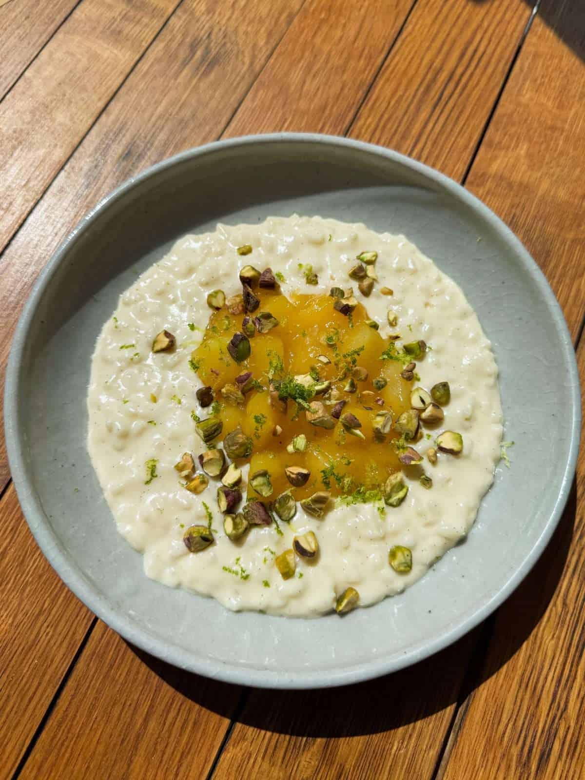 coconut rice pudding with mango compote