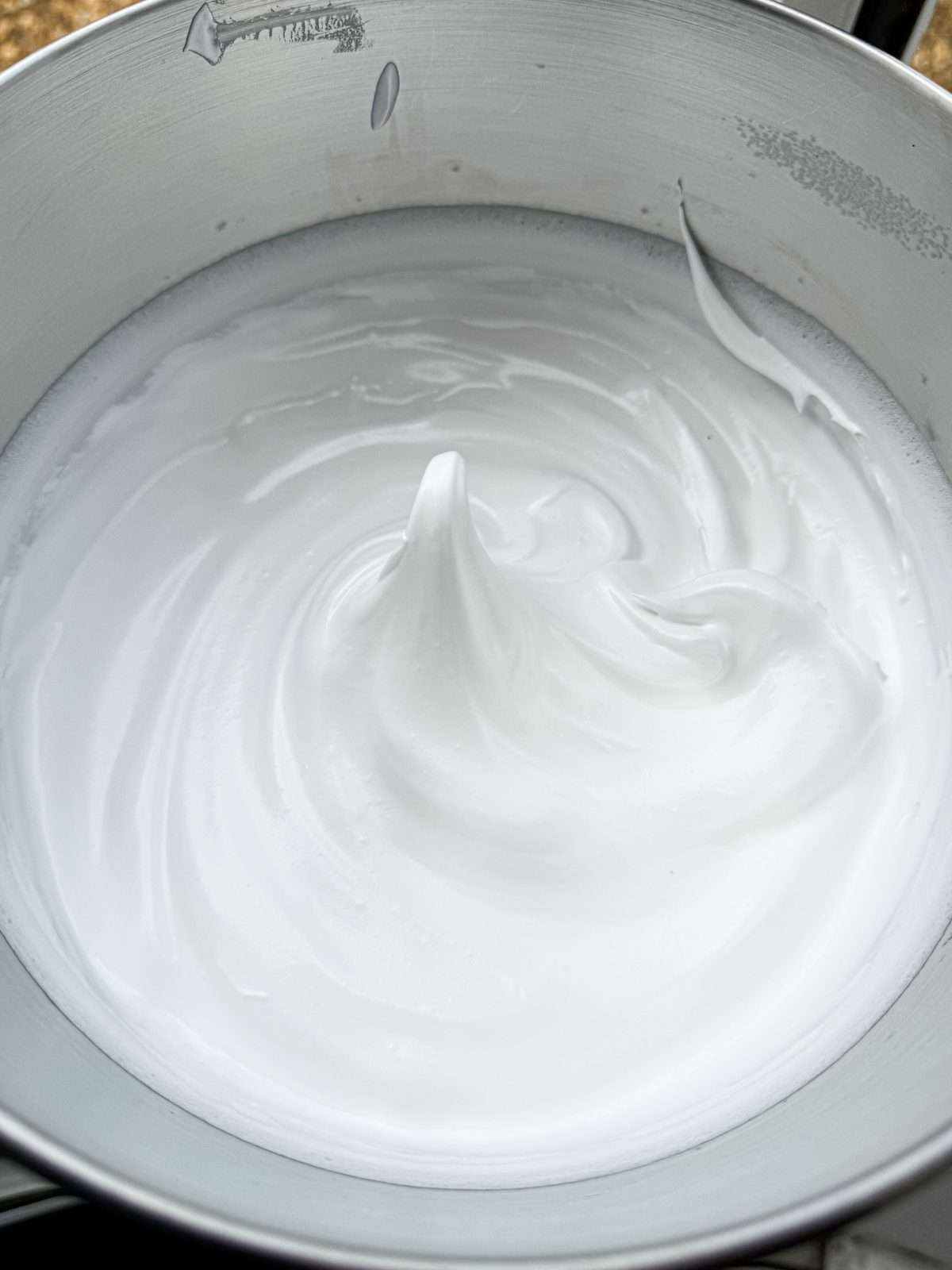 Italian meringue in mixing bowl