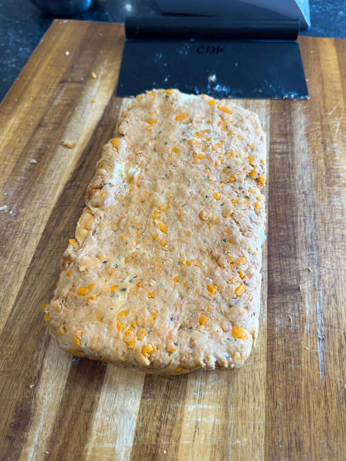 patted out rectangle of scone dough