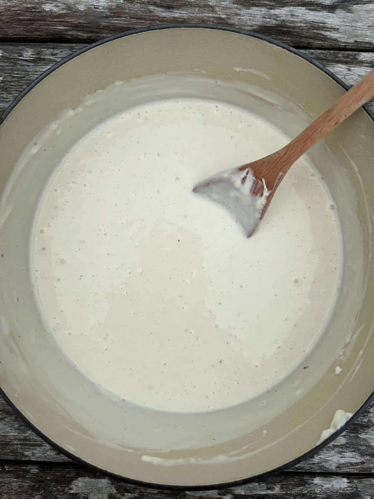 pan of roasted garlic bechamel