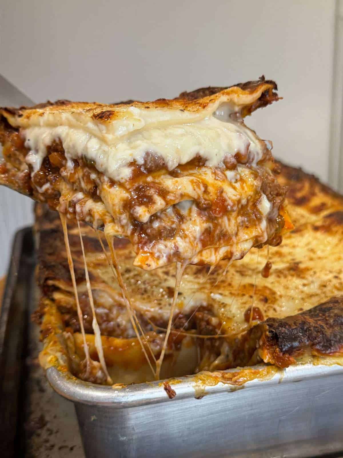 lasagne scoop cheese pull