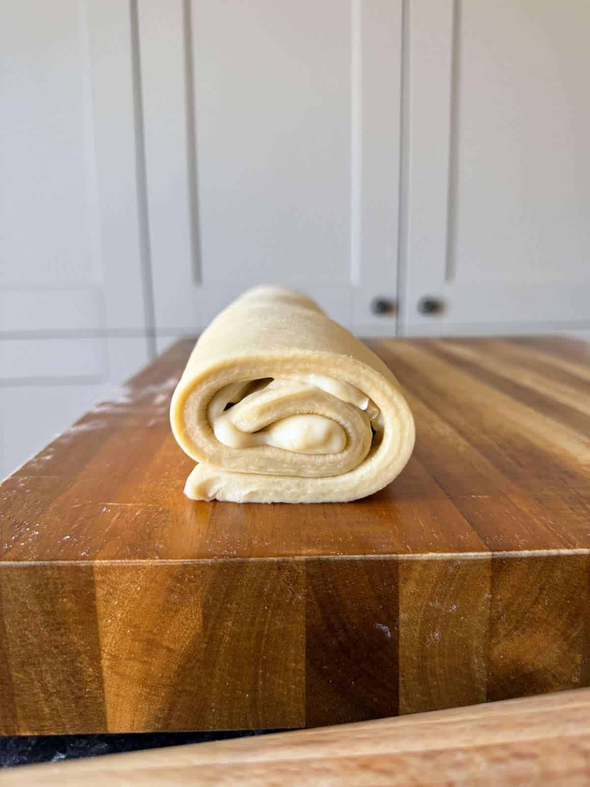 rolled danish pastry filled with custard and raisins