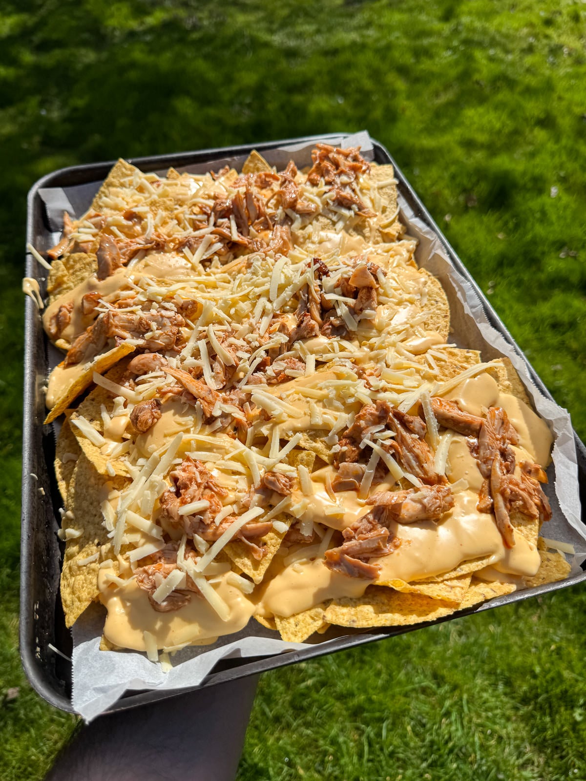 assembled chicken nachos ready to bake