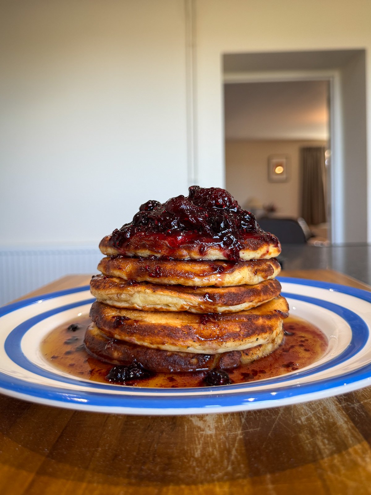 berry topped pancake stack