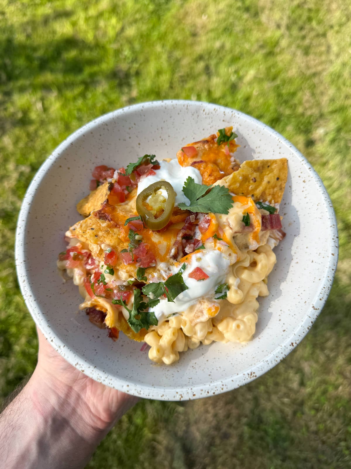 bowl of macaroni cheese with nachos