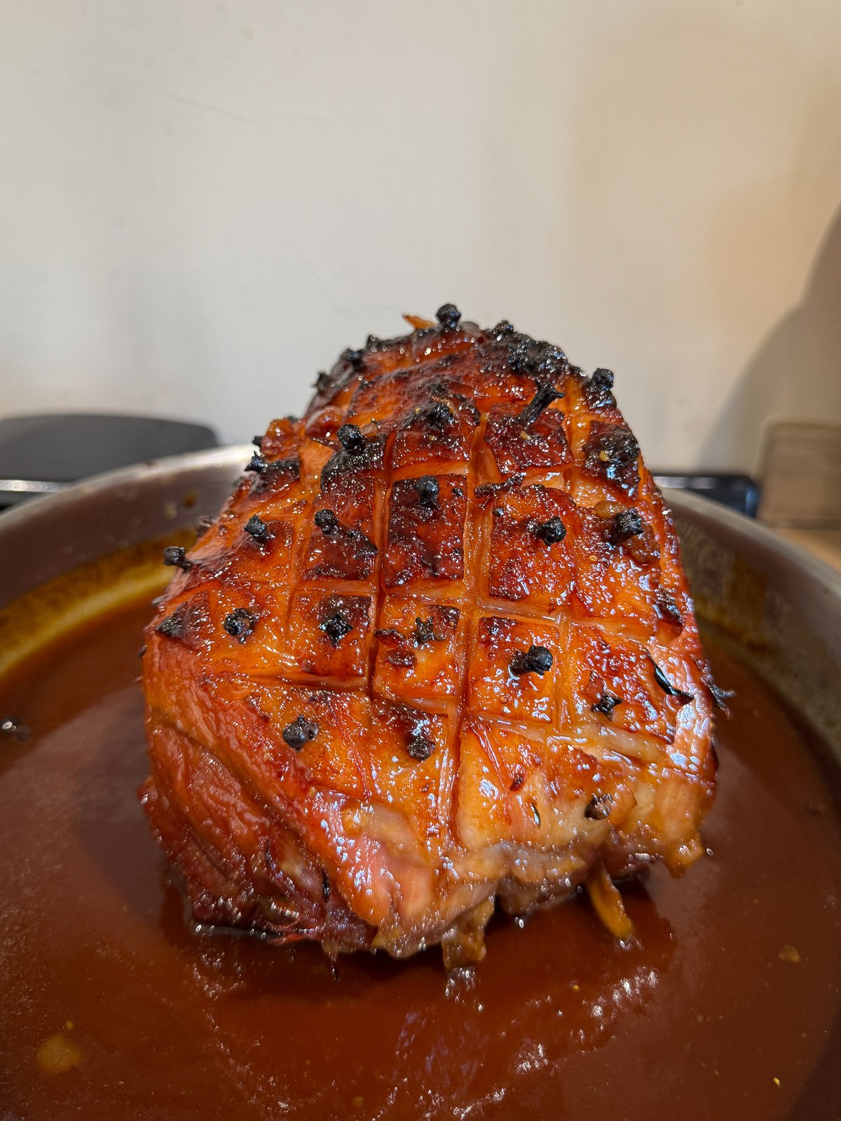 sticky toffee glazed ham in skillet