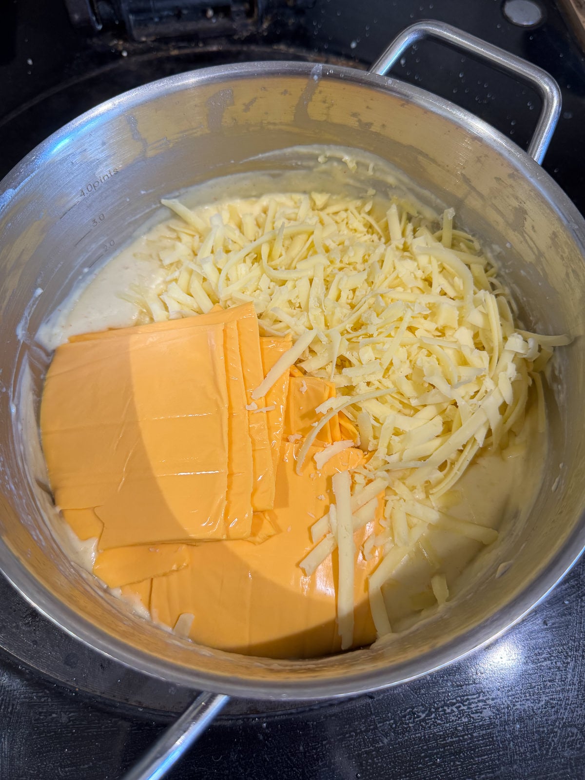 American cheese slices & cheddar for sauce