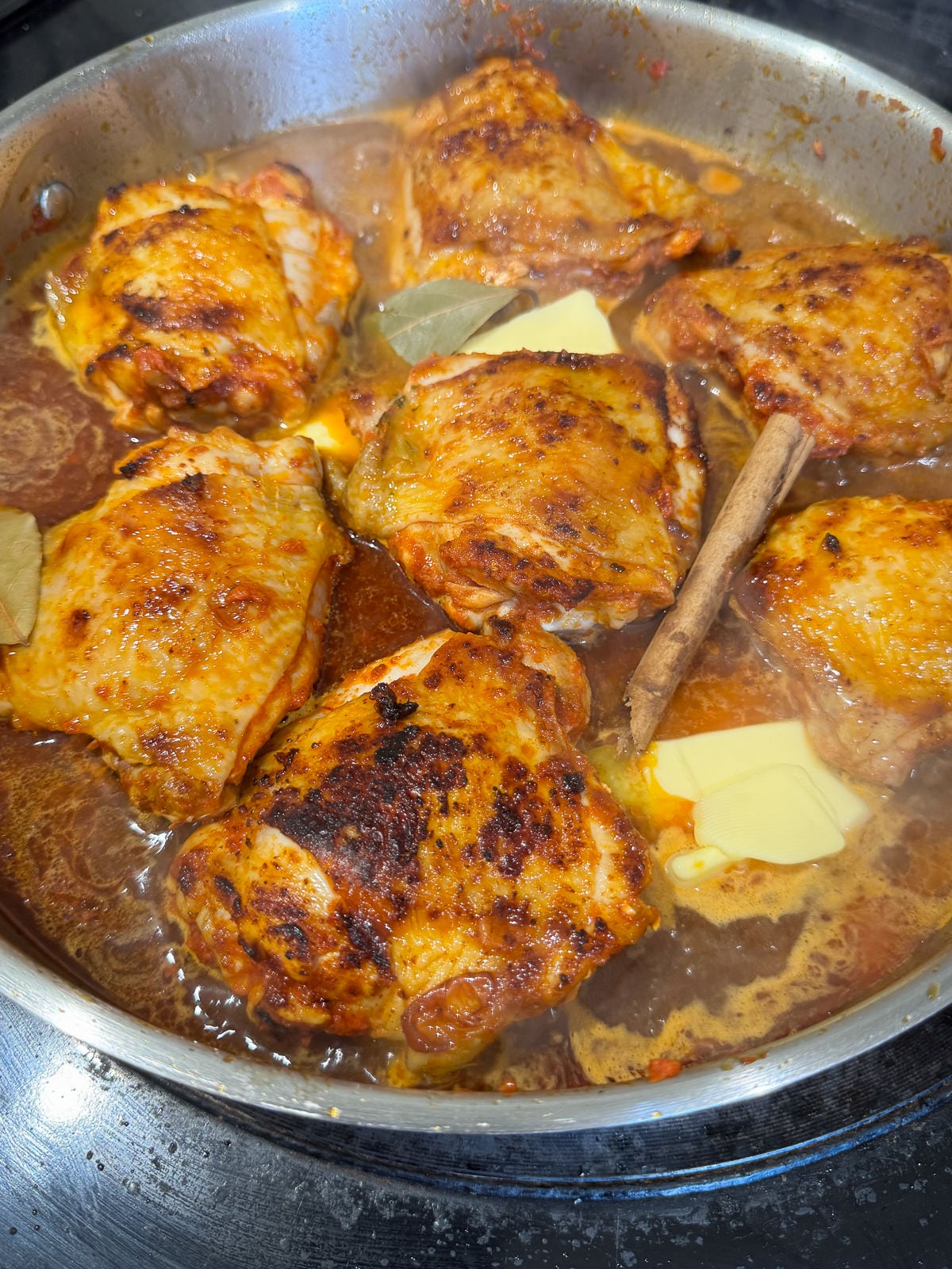 chicken thighs roasting with stock