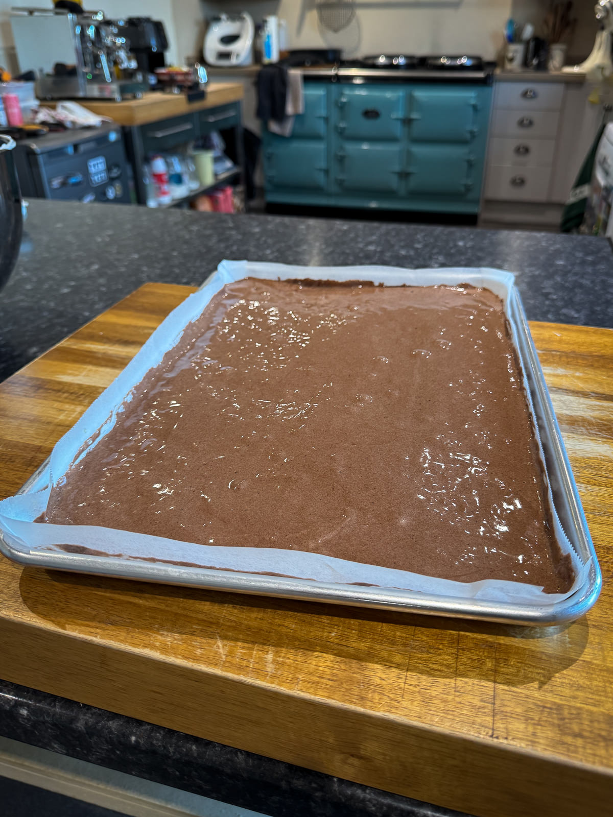 chocolate cake batter in jelly roll tin