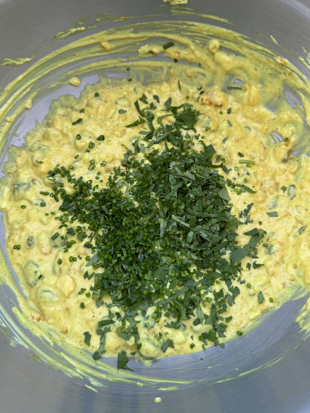 chopped herbs for coronation 