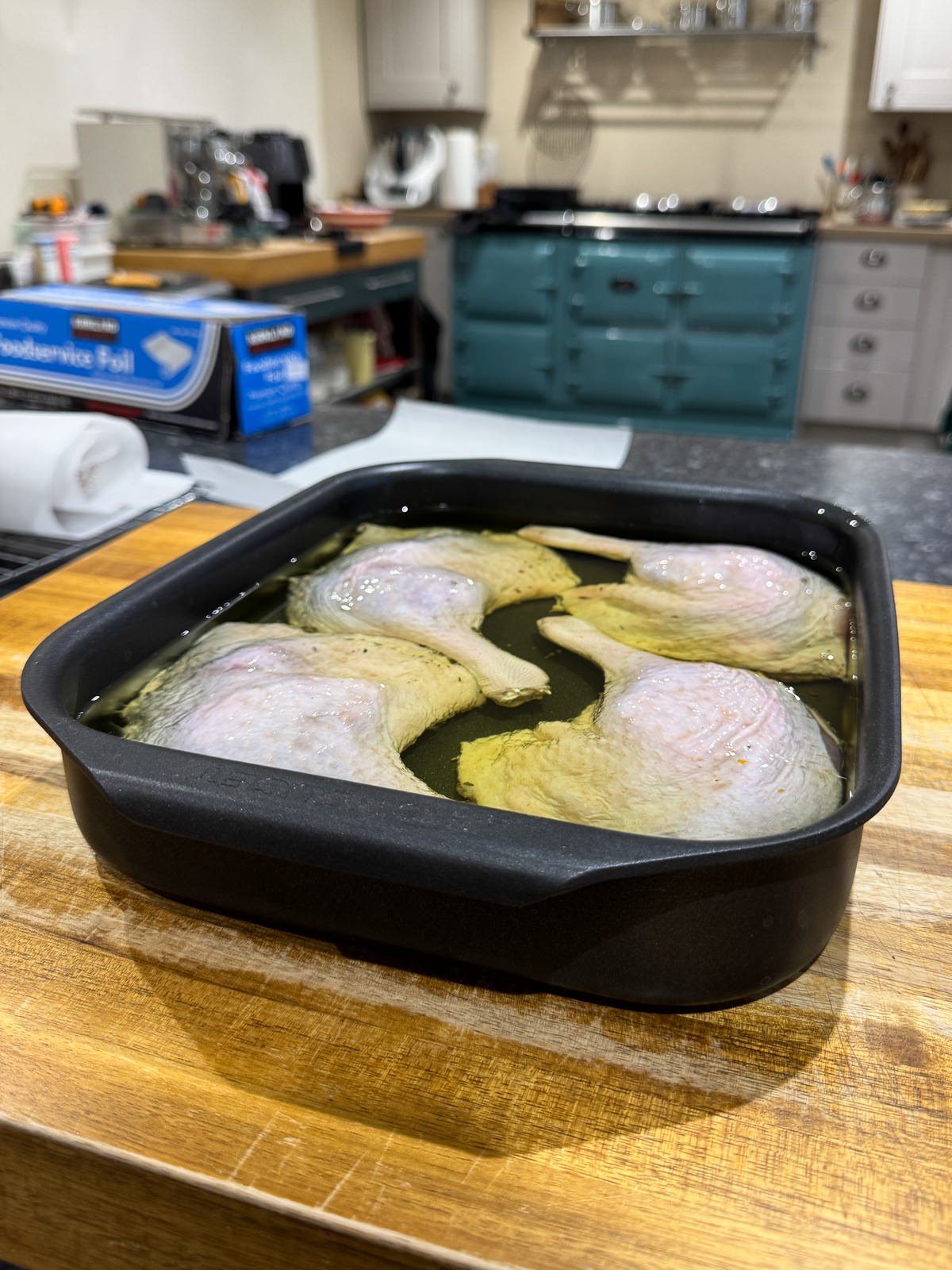 confit duck legs submerged in fat