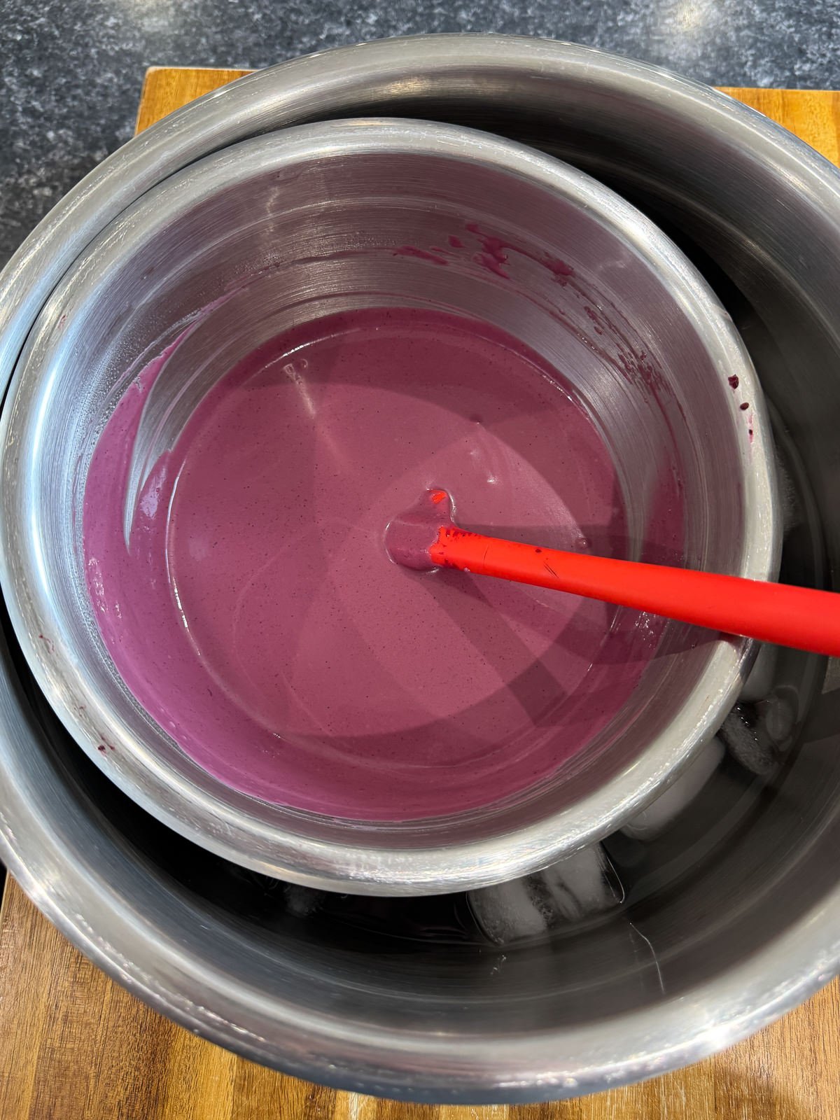 cooling panna cotta mix over ice bath