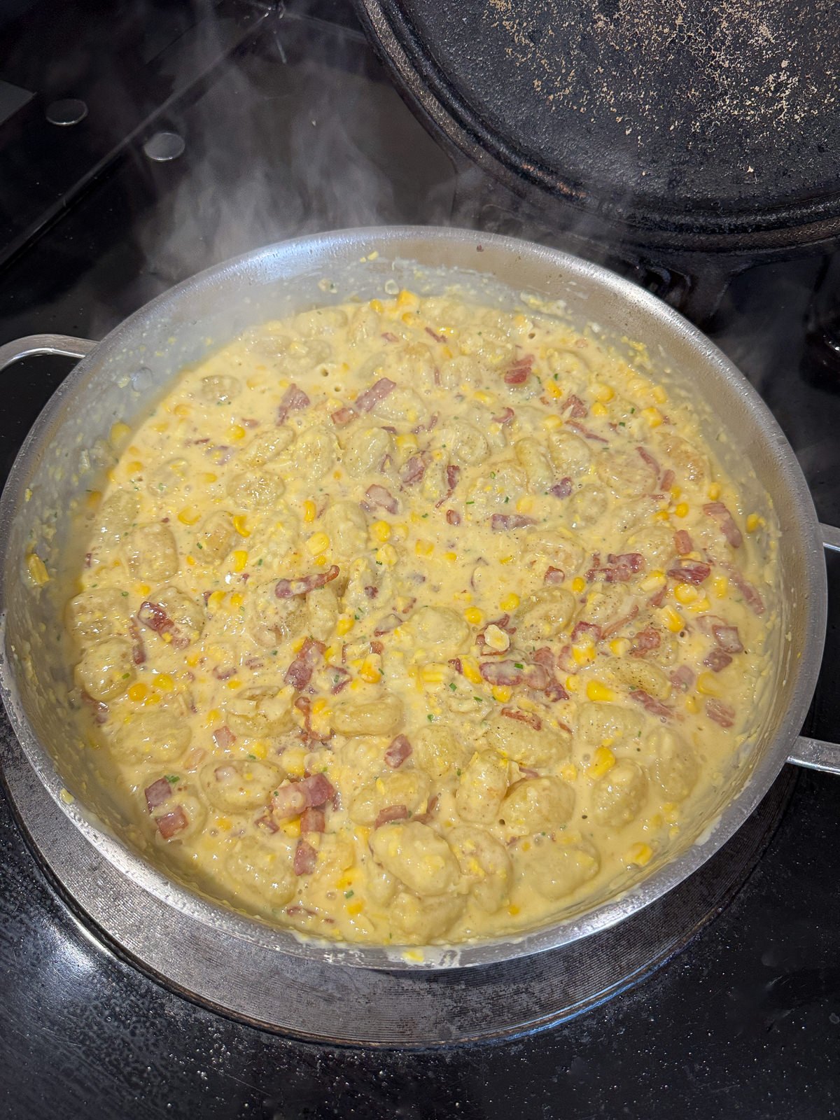 creamed corn gnocchi in pan