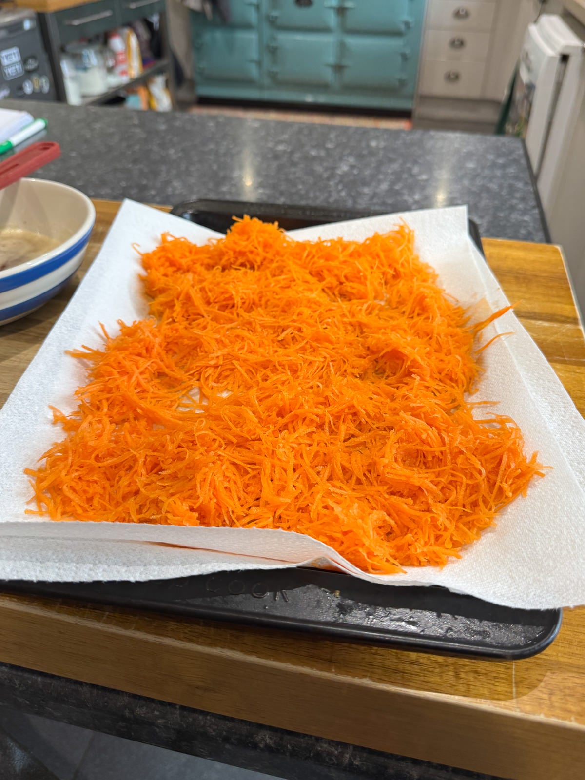 draining grated carrots for cake batter