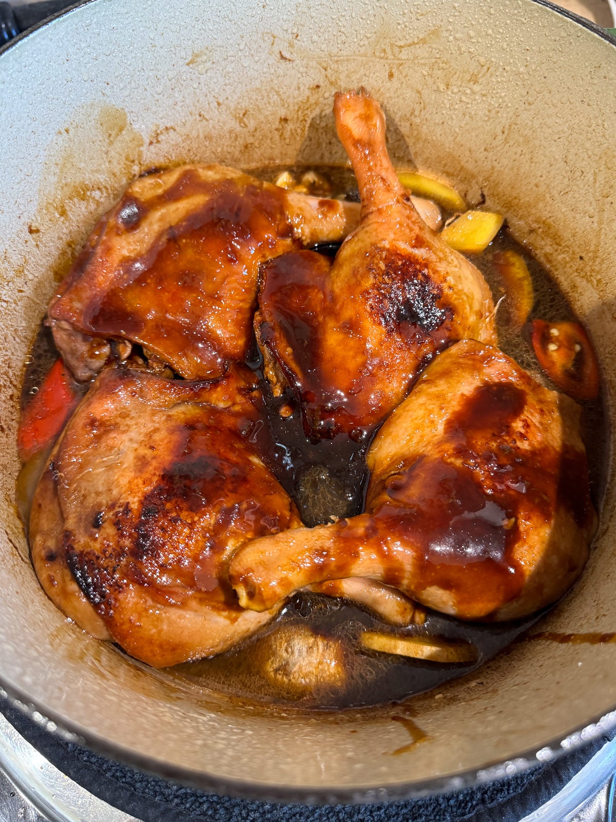 duck legs in pan ready to braise