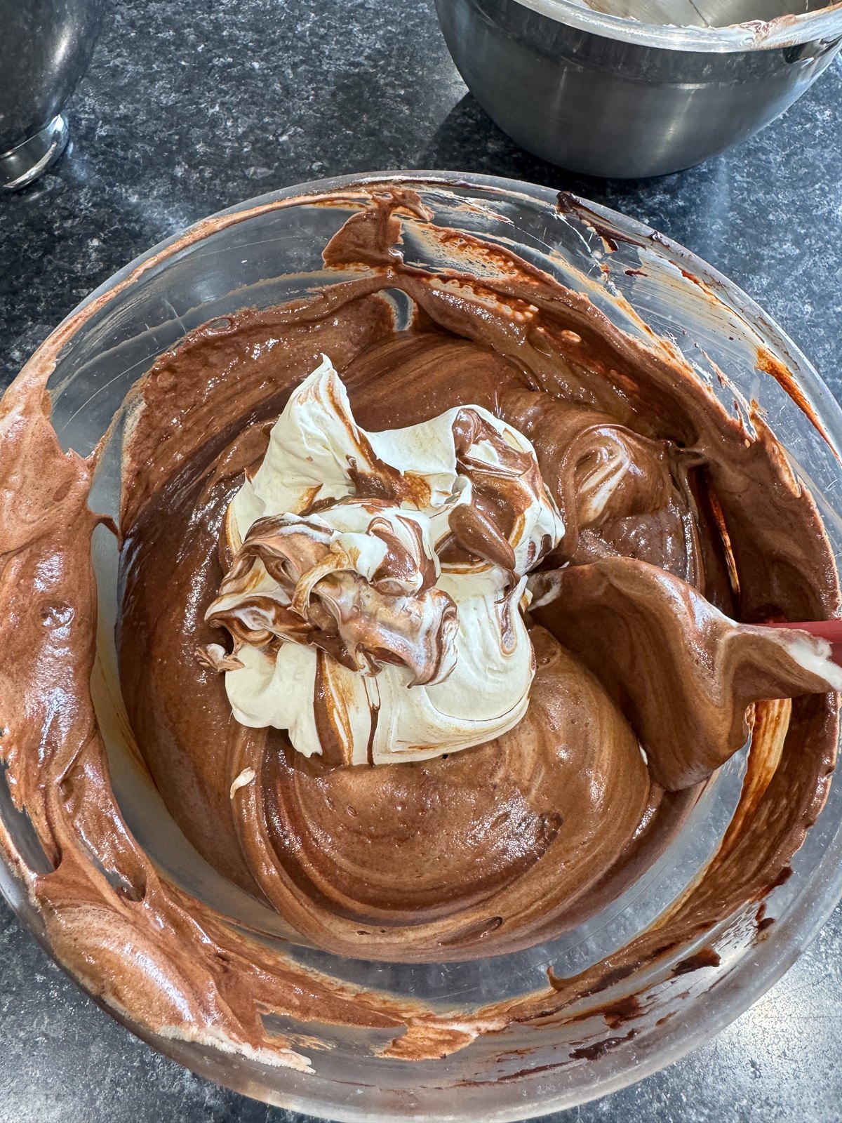 folding soft whipped cream into mousse