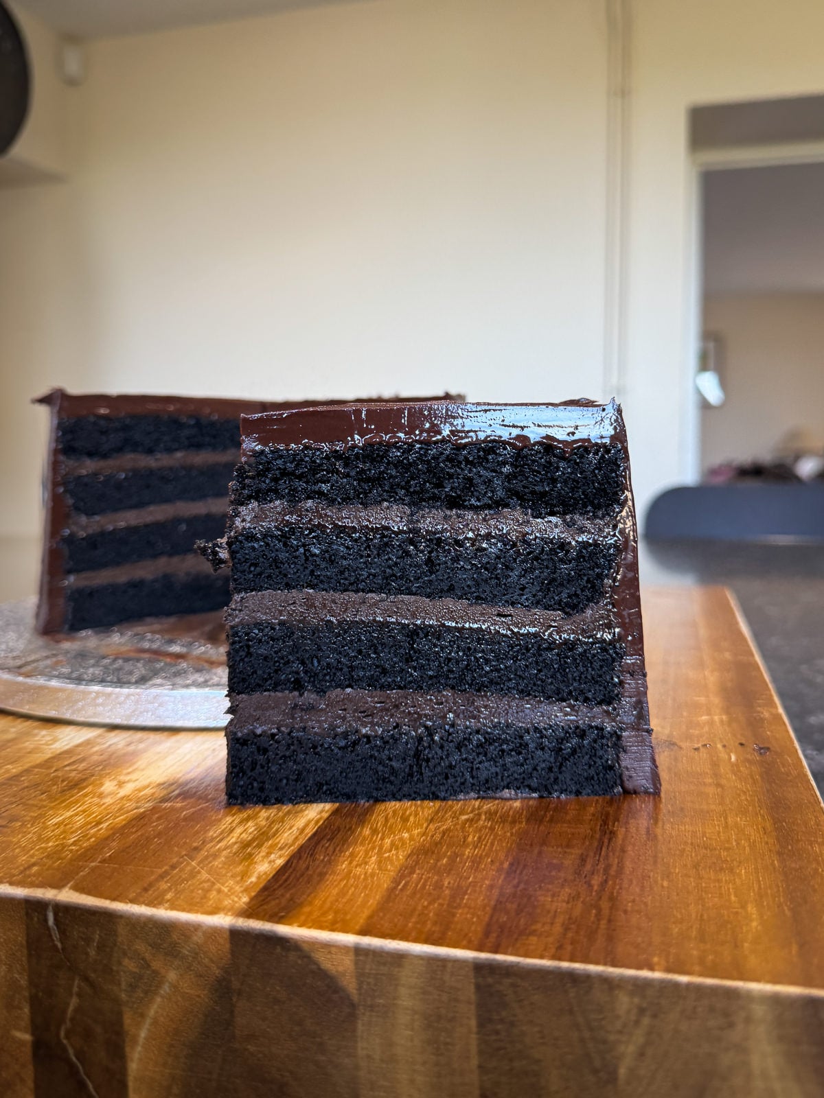 chocolate fudge frosting in layer cake