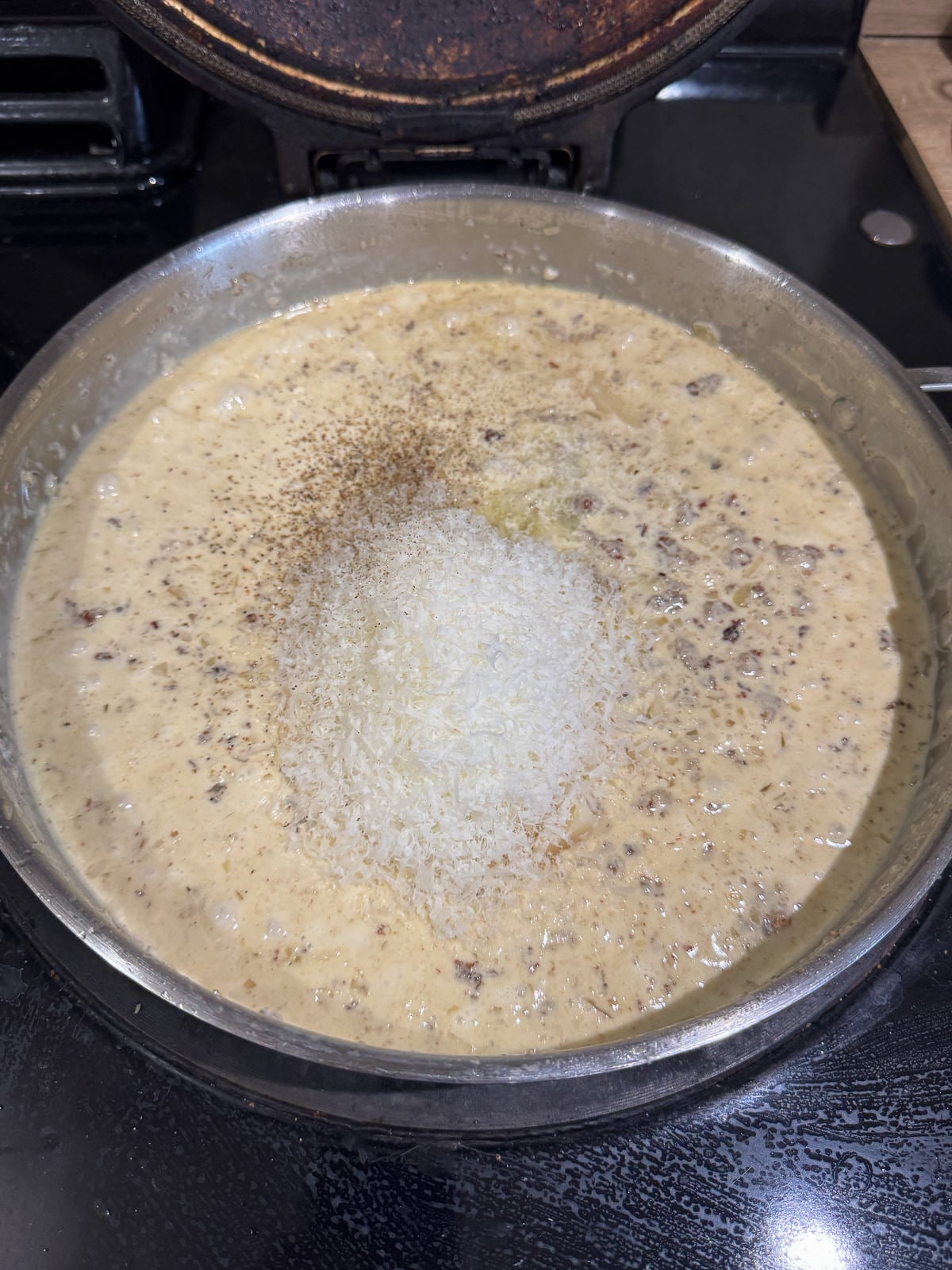 grated parmesan in white wine cream sauce