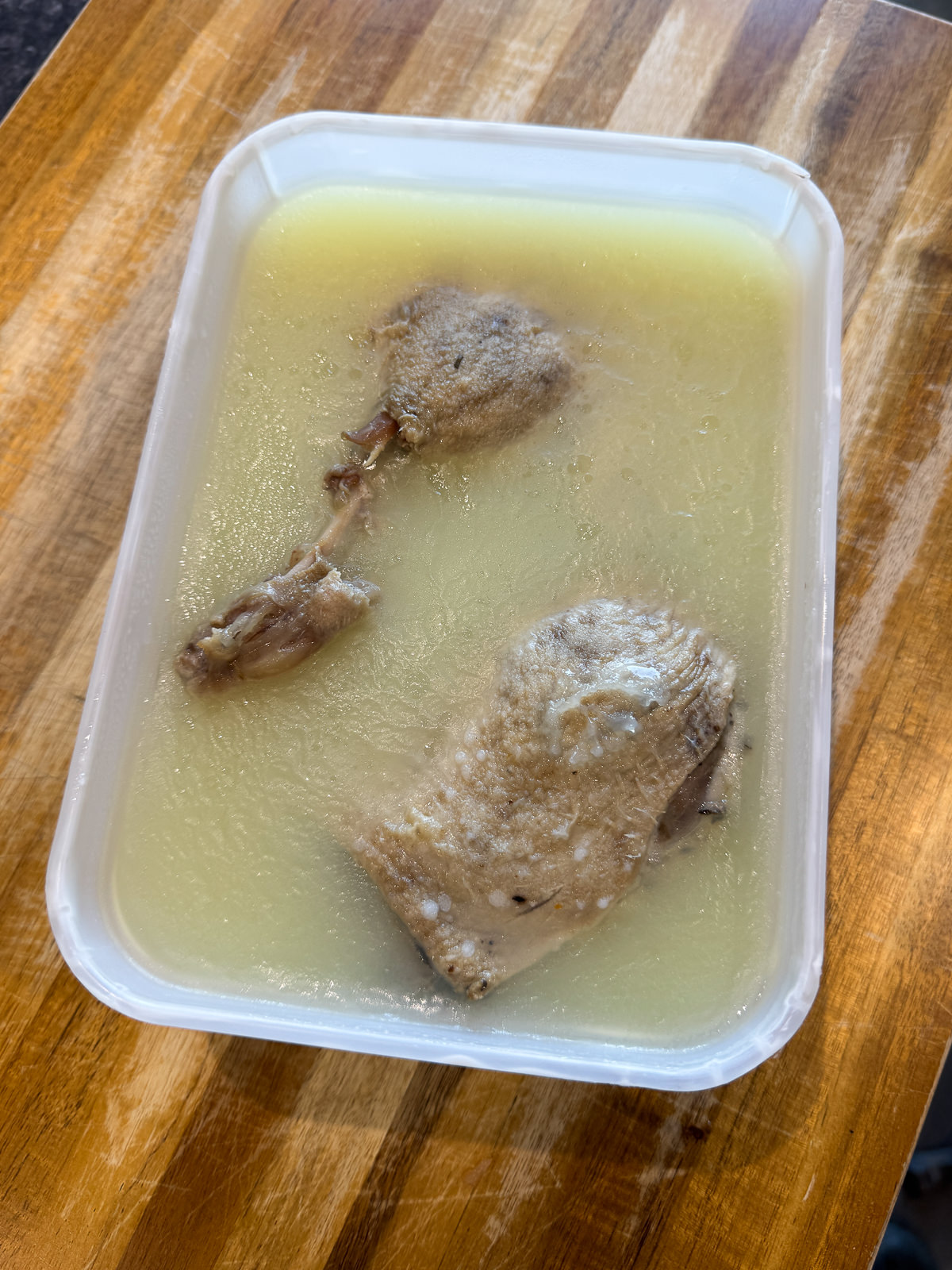confit duck legs stored in fat to preserve