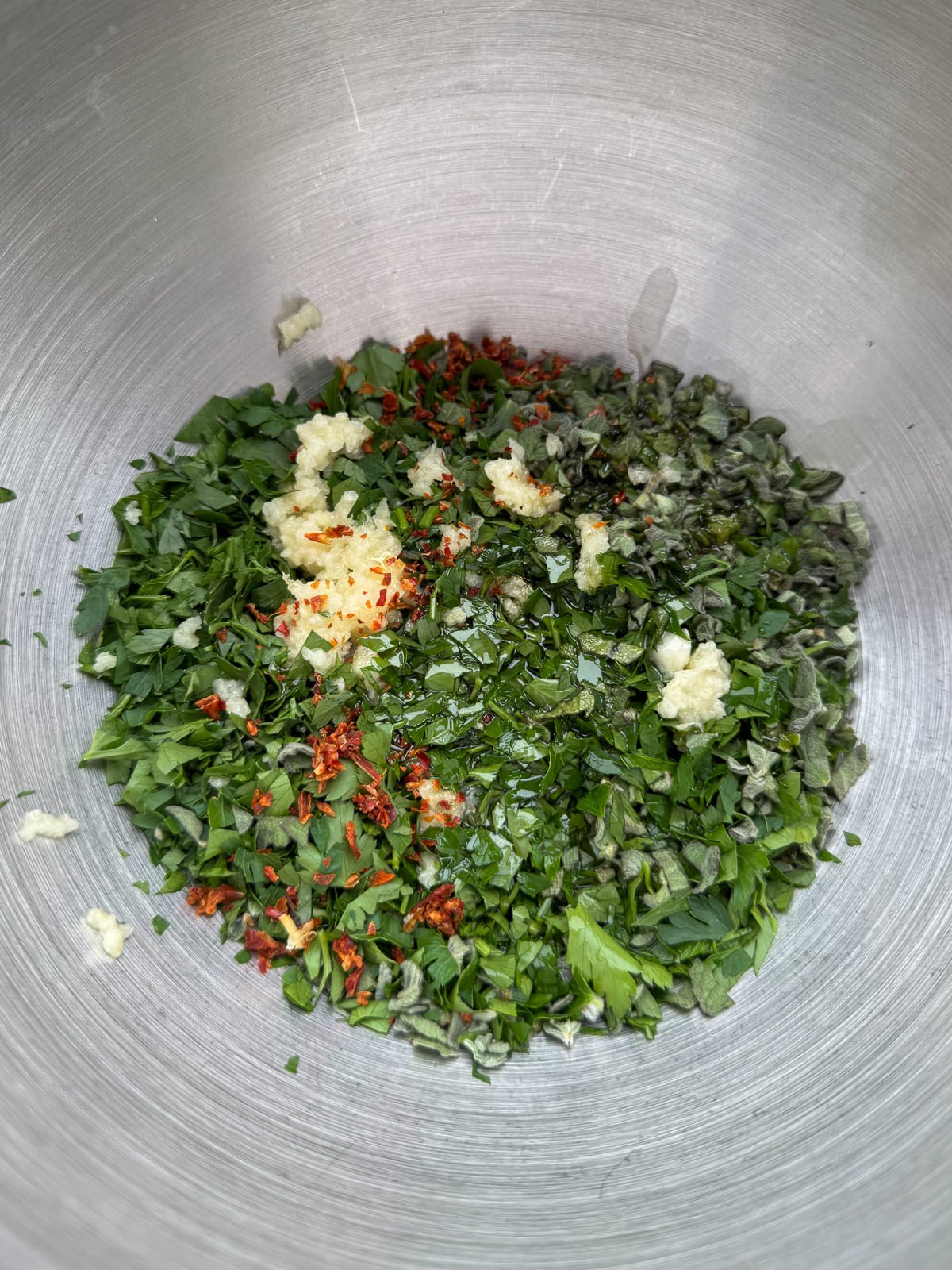 ingredients for chimichurri in mixing bowl