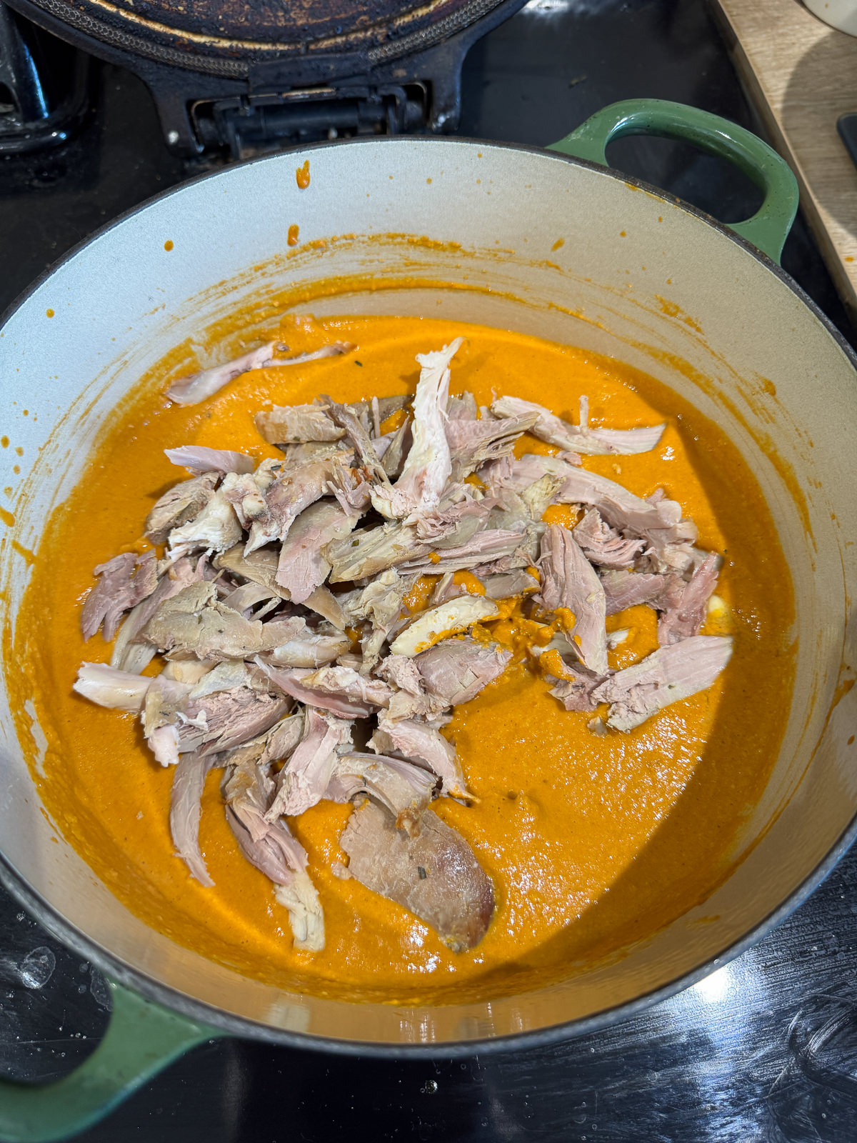 shredded leftover roast turkey in curry sauce